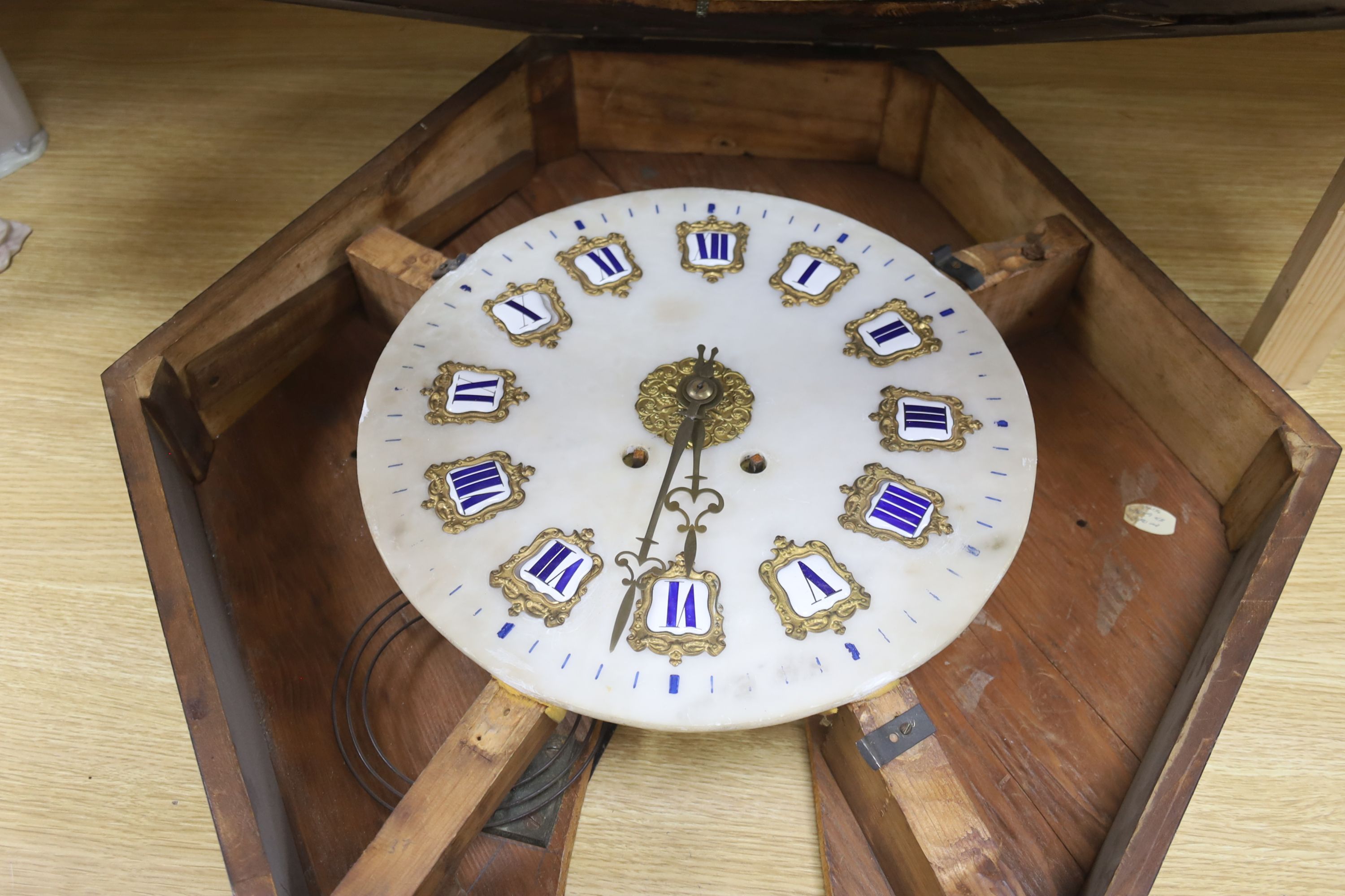 A 19th century French ebonised boulle wall clock, width 68cm length 66cm